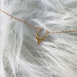 Dainty gold deer head necklace. NWOT